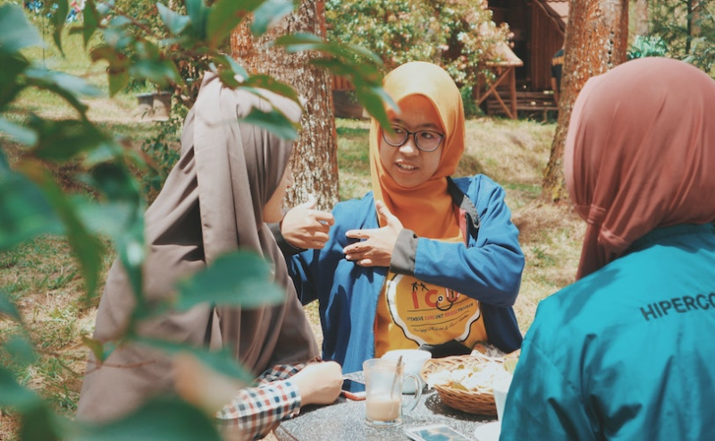 Woman chatting with friends