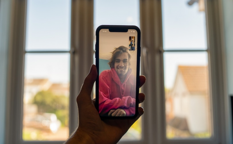 Man smiling on FaceTime